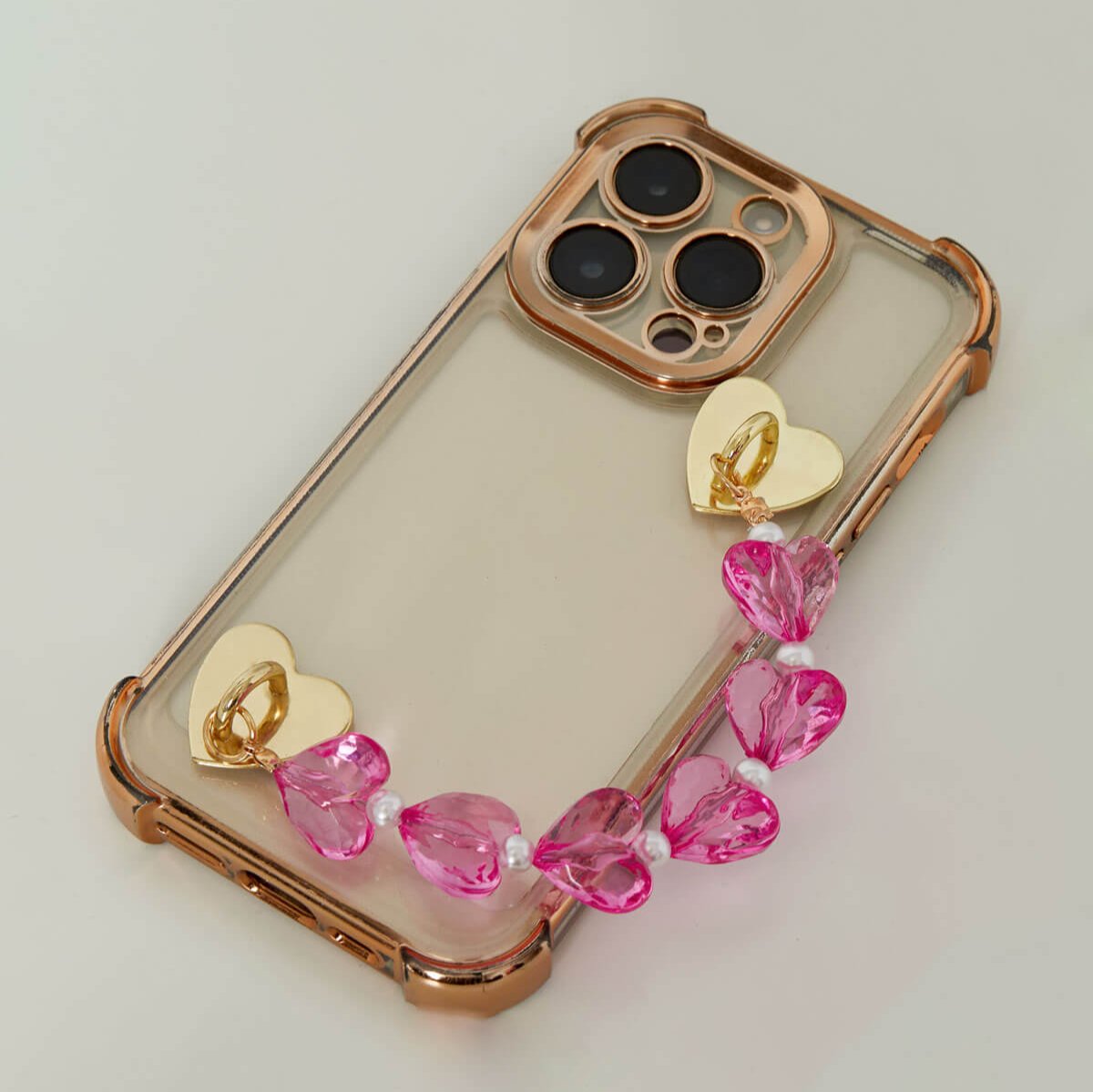 Voorbeeld Hold My Heart Telefoonkoord roze — speels kort telefoonkoord zonder hoesje voor vrouwen, universeel.
