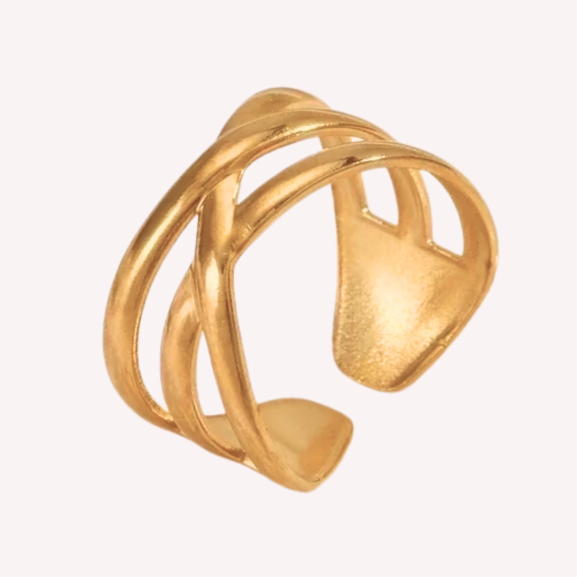 Gouden Crossed Paths een gouden statement ring voor vrouwen gemaakt van rvs.