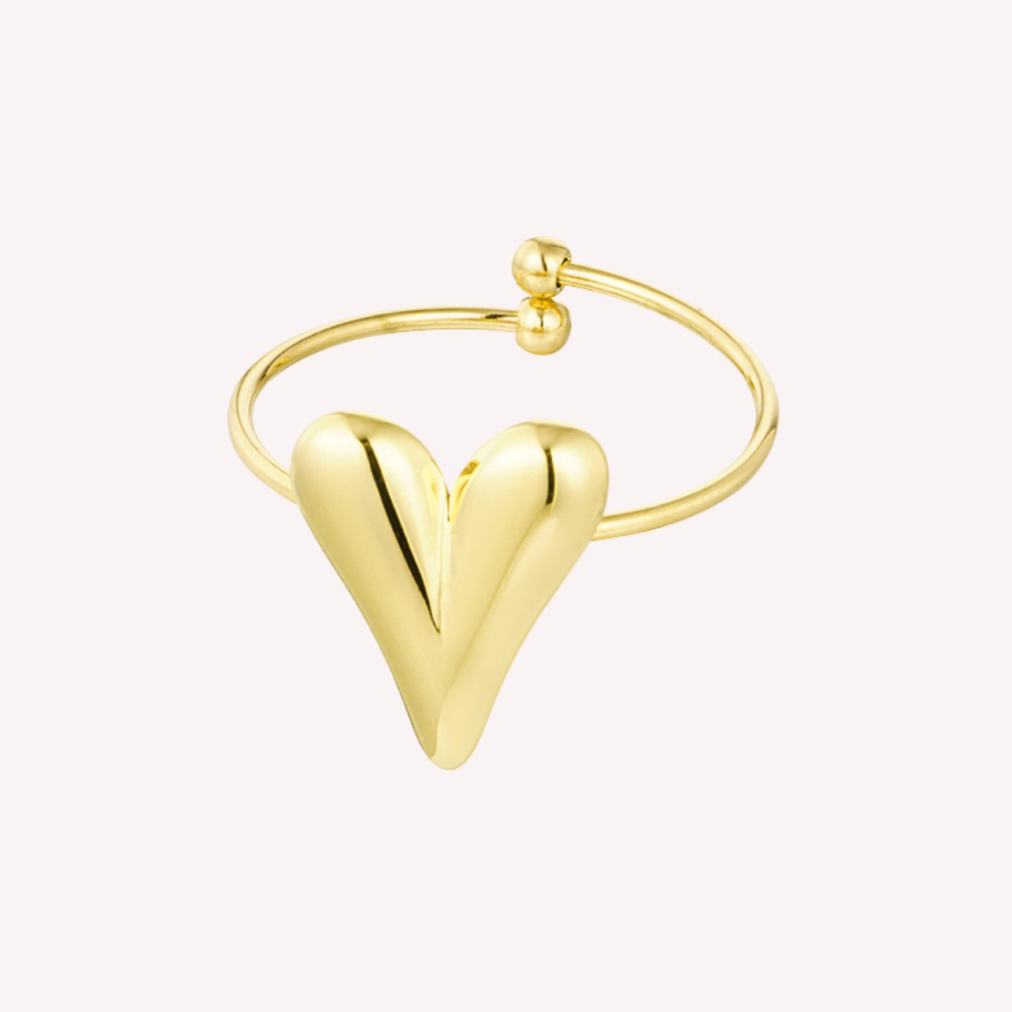Wrap Me in Love, de gouden verstelbare en roestvrij stalen ring met een harten bedel.